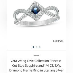 Beautiful lightly worn ring adorned with diamonds and sapphire.